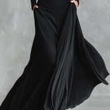 Noémie | Abito Lungo Nero con Scollatura Bateau & Drappeggio Elegante